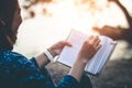 Women read books in quiet nature.