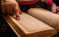 Women Reading Arabic Book with Ring in her hand HD