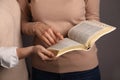 Women reading Bible together, closeup. Religious literature Royalty Free Stock Photo