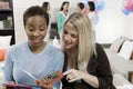 Women Reading Greeting Card At A Baby Shower Royalty Free Stock Photo