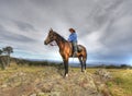 Women rider on a mountain Royalty Free Stock Photo