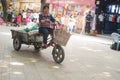 Women riding a tricycle