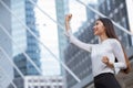 Women rise her hand for business winner success