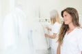 Women in room with rail labcoats Royalty Free Stock Photo