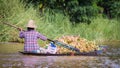 Women rowing a dugout canoe in Inle Lake, Myanmar.