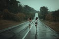 Women run on the road.