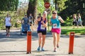 Women runners give thumbs up sign during 5K charity run Royalty Free Stock Photo