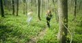 Women running in forest.