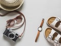 Women\'s accessories - comfortable sandals, straw hats, retro camera, sunglasses, wristwatch Royalty Free Stock Photo