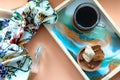 Women`s accessories - perfume, scarf, cup of coffee with biscuit on tray. Mockup for elegant concept. Flat lay, top view, copy Royalty Free Stock Photo