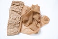 Women`s beige nylon stockings on a white background close up Royalty Free Stock Photo