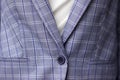 Women`s blue plaid jacket fastened with a button, combined with a white t-shirt, style, fashion Royalty Free Stock Photo