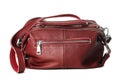 Women`s burgundy bag made of artificial textured leather with lots of metal locks