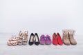 Women`s choice of footwear for all seasons. Women`s shoes in a row on a white background Royalty Free Stock Photo