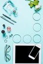 Women's clothes and accessories on a turquoise background Royalty Free Stock Photo