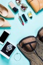 Women's clothes and accessories on a turquoise background Royalty Free Stock Photo