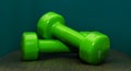 Women`s colored dumbbells for sports and fitness close up on a solid background