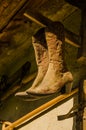 Women`s cowboy boots. Atmosphere of the countryside. Western. Royalty Free Stock Photo