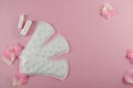 Women`s cycle hyhienic pads and tampons on pink background. Copy space Royalty Free Stock Photo