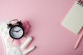 Women`s cycle hyhienic pads and tampons on pink background. Copy space Royalty Free Stock Photo