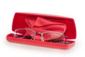 Women`s eyeglasses in red hard spectacle-case with glasses wipe Royalty Free Stock Photo