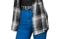 Women fashion clothing style checkered black white woolen shirt blue jeans girl figure isolated background Royalty Free Stock Photo