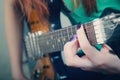 Girl playing the guitar