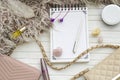 Women`s flatlay with notebook, handbag, cosmetics, cristall and minerals. Royalty Free Stock Photo