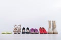 Women`s footwear collection for any weather and all seasons. A row of women`s shoes Royalty Free Stock Photo