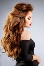 Women`s hair. A luxurious young model with shiny, healthy, long