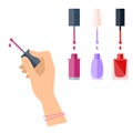 Women`s hand with cosmetic product: nail varnish and polish.