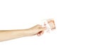 Women`s hand holds five thousand roubles on a white background. Royalty Free Stock Photo