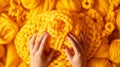 Women\'s hands close-up, knitting, Crochet.top view on pure soft yellow background.AI generated