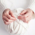 Women\'s hands close-up, knitting, Crochet.top view on pure white background.AI generated.artificial intelligence