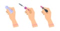 Women`s hands with cosmetic accessories: lipstick, mascara brush
