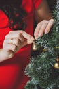 Women's hands are decorated with Christmas tree