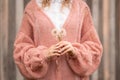 Women`s hands hold fluffy dandelions. Late summer. Royalty Free Stock Photo