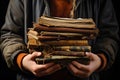 Women\'s hands hold a stack of very old books. Ai generative Royalty Free Stock Photo