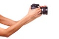 Women's hands holding the camera. Royalty Free Stock Photo