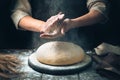 Women`s hands knead the dough, from which they will then make bread, or pizza Royalty Free Stock Photo