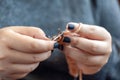 Women`s hands knit from color wool. Hand knitting