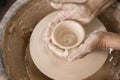 Women`s hands and potter`s wheel Royalty Free Stock Photo