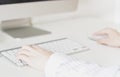 Women`s hands using a wireless keyboard and mouse Royalty Free Stock Photo