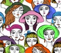 Women`s heads in colored hats and scarves Royalty Free Stock Photo