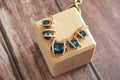 Women`s jewelry gold jewelry necklace with blue a gemstone Royalty Free Stock Photo