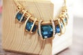 Women`s jewelry gold jewelry necklace with blue a gemstone Royalty Free Stock Photo