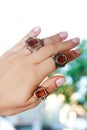 Women`s jewelry gold and silver rings with precious stones.