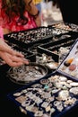 Women's Jewelry, small business. Handmade Colored Bracelets on the counter of a street market. Close-up. Selective