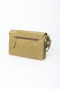 Women's khaki leather bag, isolate on a white background. Back view Royalty Free Stock Photo