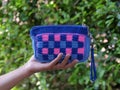 Women's knit handbag with a blend of bright and youthful looking colors.